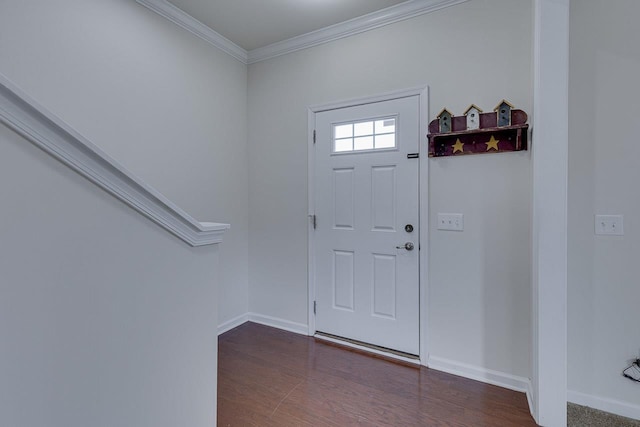 foyer with crown molding and dark hardwood / wood-style floors