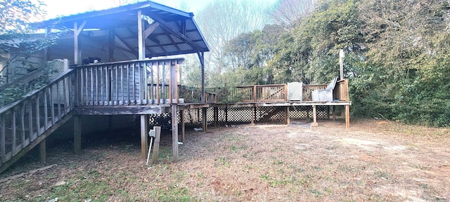 view of yard with a deck