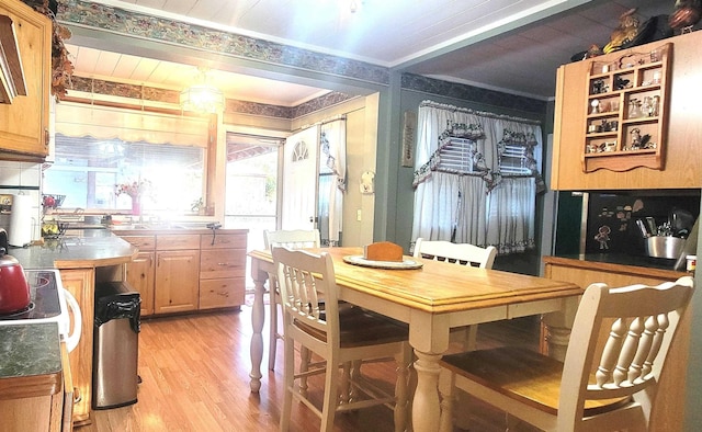 dining area featuring light wood-type flooring