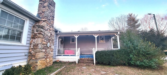 view of home's exterior featuring covered porch