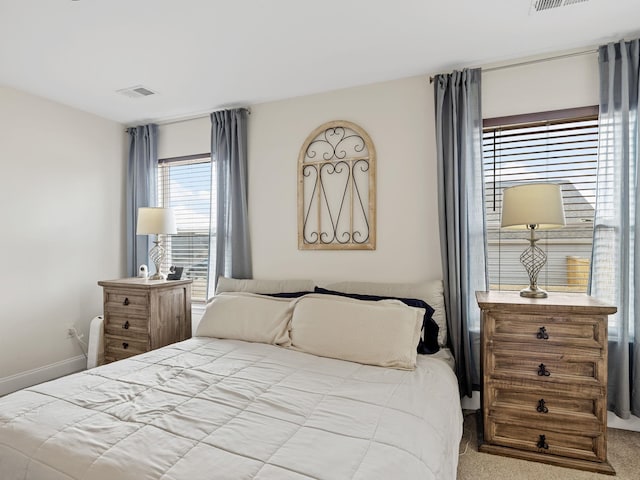 bedroom featuring carpet