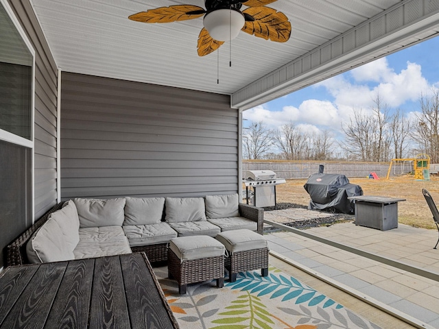 view of patio / terrace with area for grilling, an outdoor hangout area, and a playground