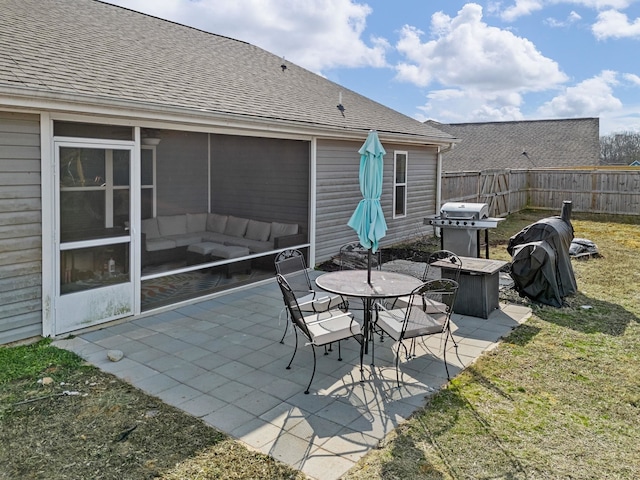 view of patio / terrace with a sunroom