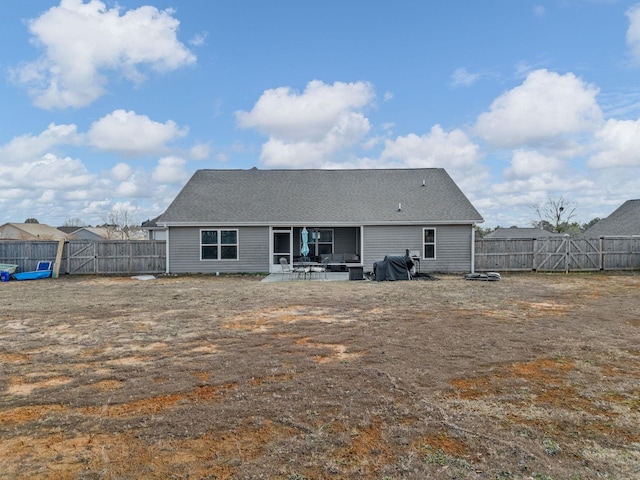 back of house featuring a patio area