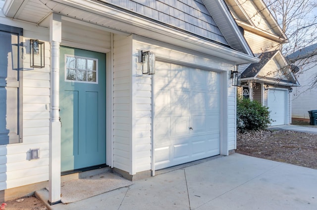 entrance to property featuring a garage