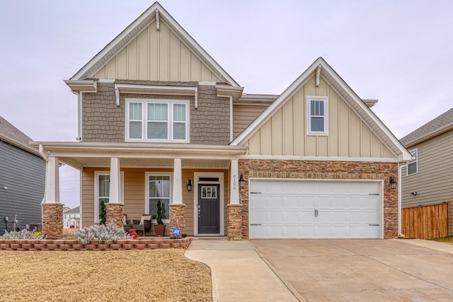 craftsman-style house featuring a porch and a garage