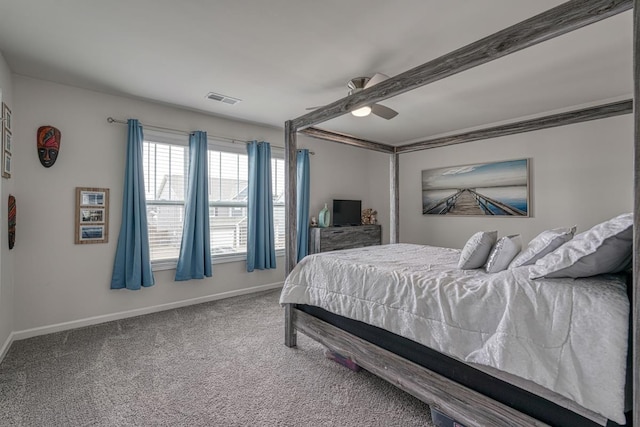 bedroom featuring ceiling fan and carpet