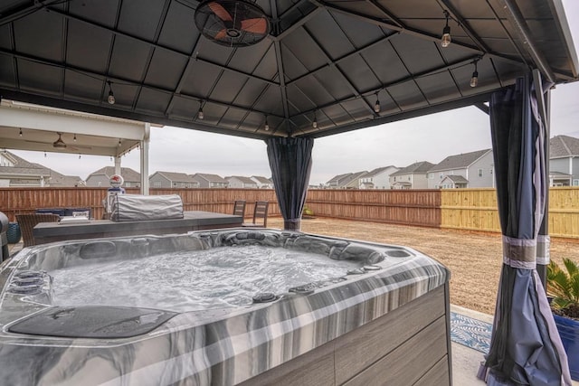 view of patio with a gazebo and a hot tub