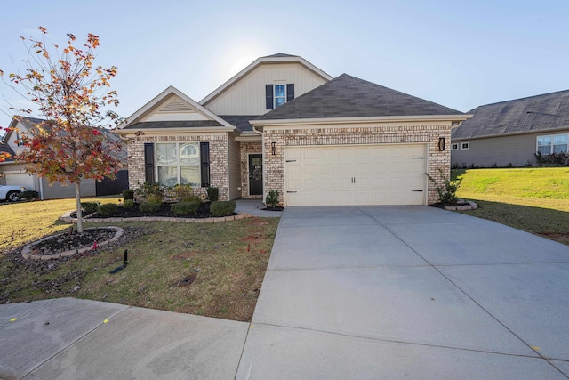 view of front of home with a garage and a front yard