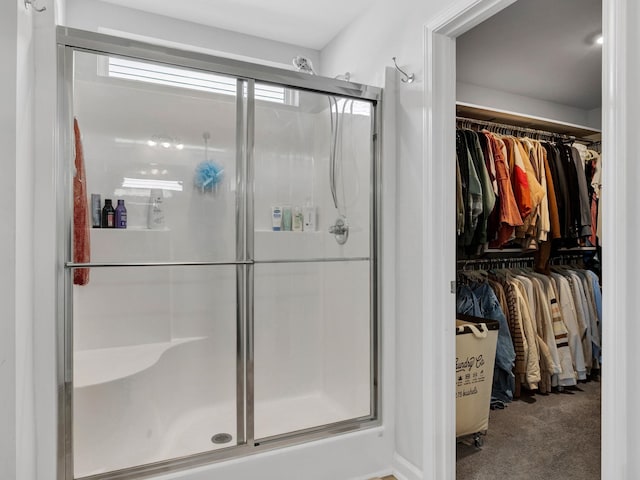 bathroom featuring an enclosed shower