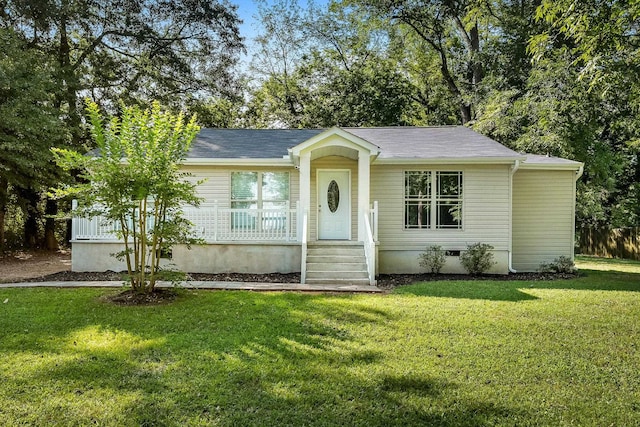 single story home featuring a front yard