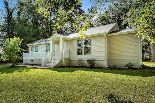 ranch-style home with a front lawn