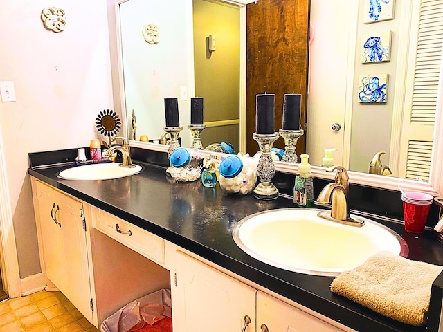 bathroom featuring vanity and tile patterned floors