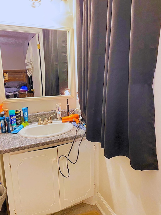 bathroom featuring vanity and tile patterned floors