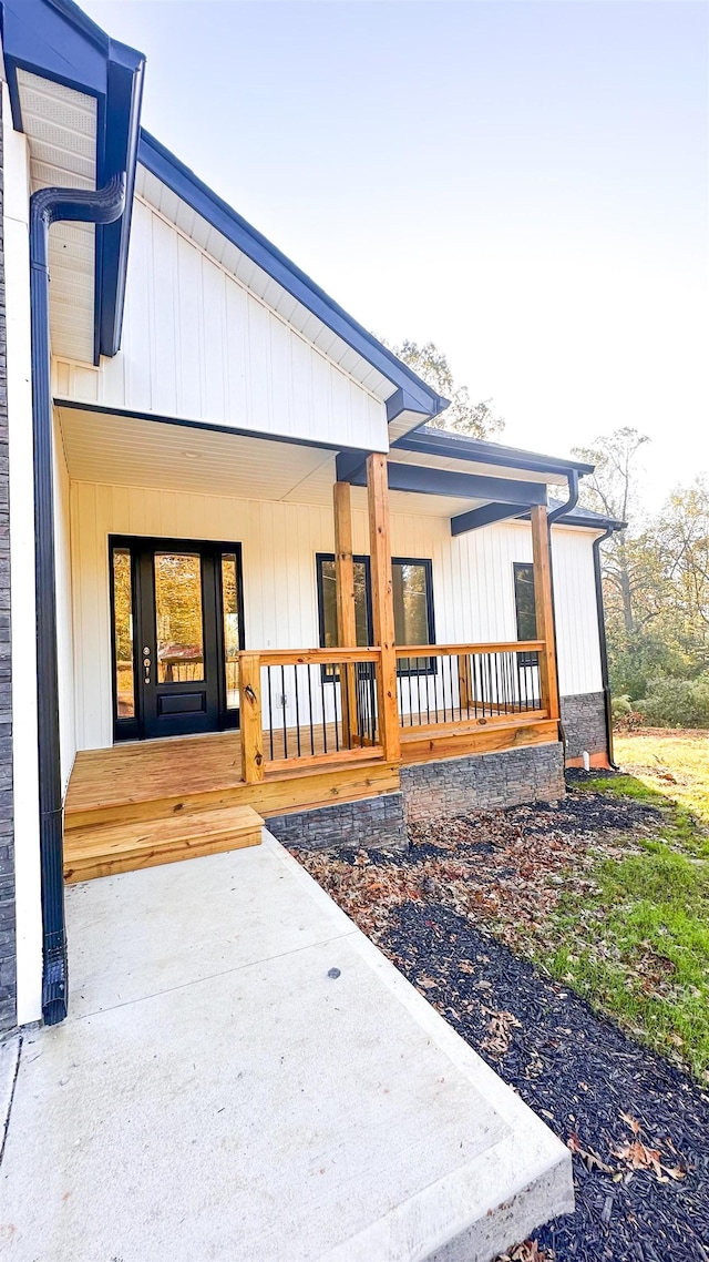 exterior space featuring covered porch