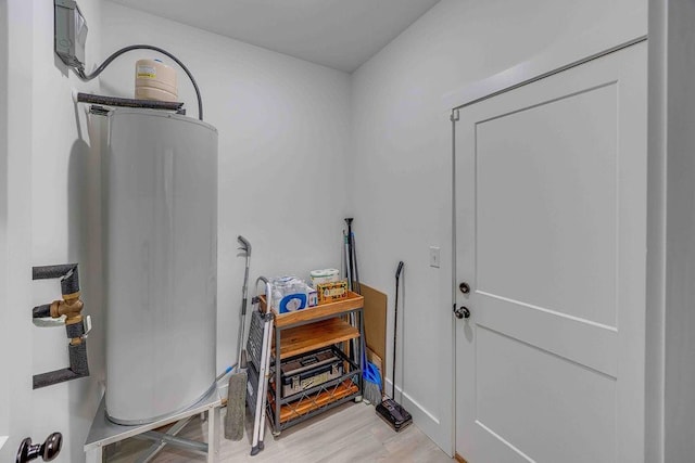 interior space with water heater and light wood-type flooring