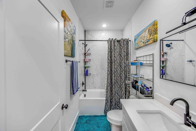 full bathroom featuring vanity, toilet, and shower / bath combo with shower curtain