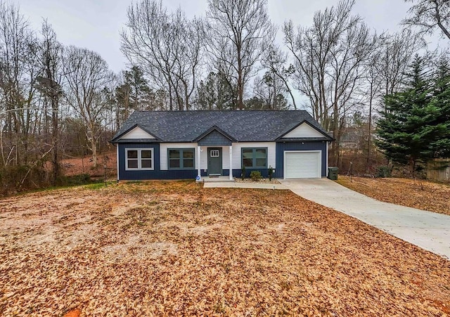 ranch-style home with a garage