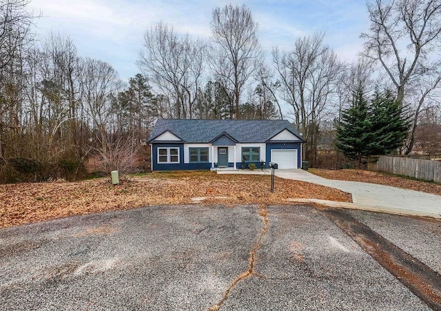 single story home with a garage