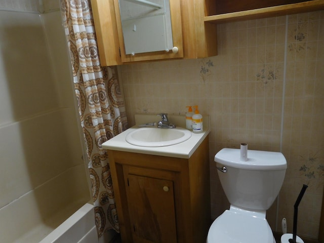 full bathroom with tile walls, shower / bath combination with curtain, backsplash, vanity, and toilet