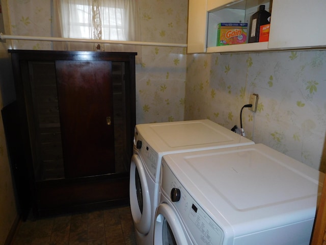 washroom with washer and dryer