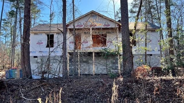 back of house with crawl space