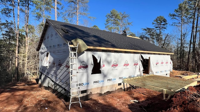 view of side of home with crawl space