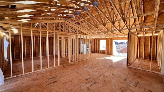 misc room with lofted ceiling