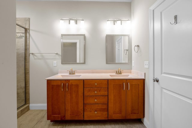 bathroom with vanity and an enclosed shower