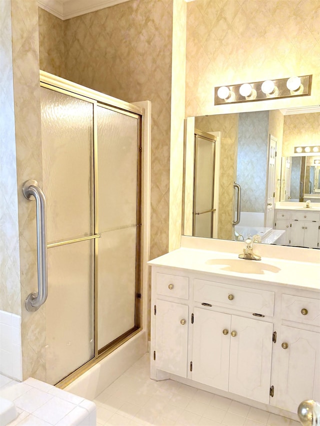 bathroom featuring vanity, tile patterned flooring, and a shower with door