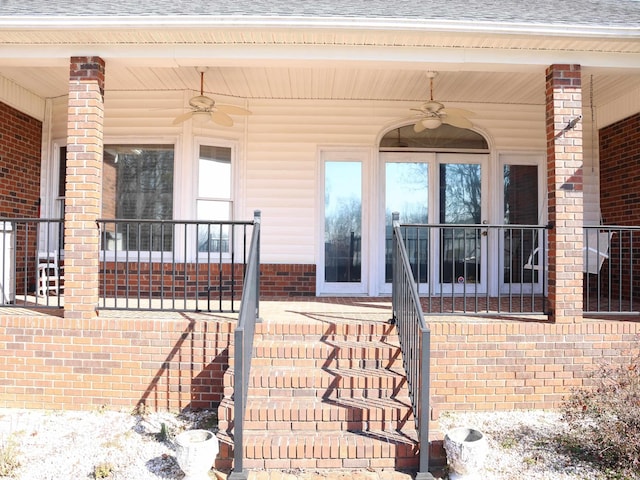 doorway to property with ceiling fan