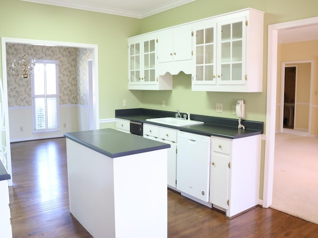 kitchen with sink, white cabinetry, crown molding, a center island, and dishwasher