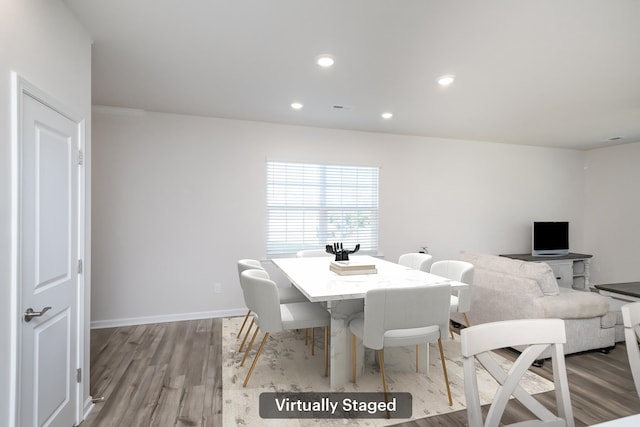 dining area with light wood-type flooring