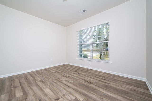 empty room featuring hardwood / wood-style floors