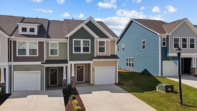 view of front facade featuring a garage and a front lawn