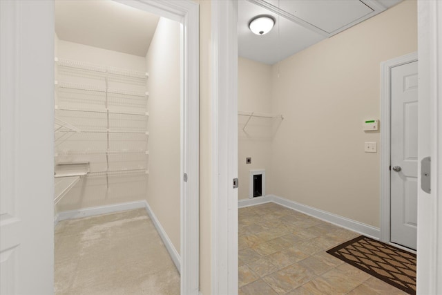 clothes washing area with hookup for an electric dryer