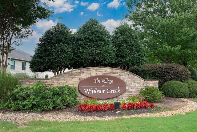 view of community sign