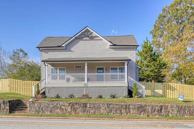 view of front of home featuring covered porch