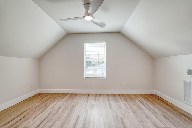 bonus room with ceiling fan, lofted ceiling, and light hardwood / wood-style floors