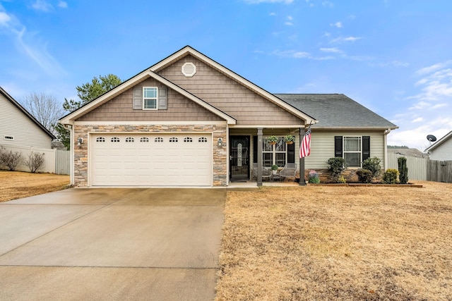 craftsman house featuring a porch and a front lawn