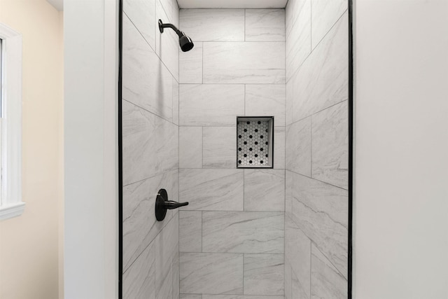 room details with a tile shower