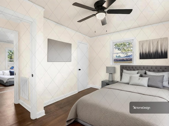 bedroom with ceiling fan and dark hardwood / wood-style floors