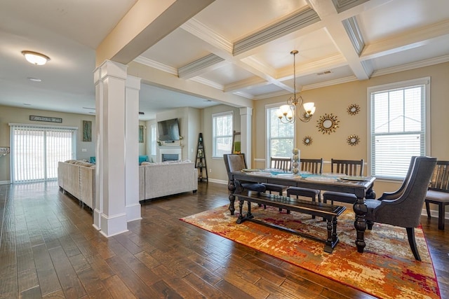 dining space with beamed ceiling, coffered ceiling, dark hardwood / wood-style flooring, and ornate columns