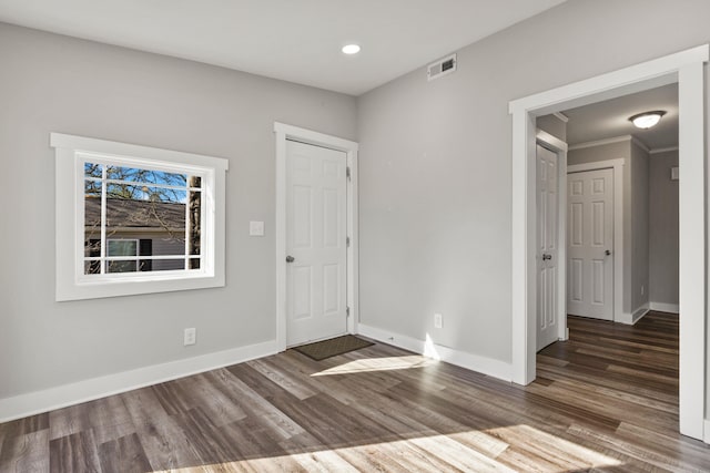 foyer featuring dark hardwood / wood-style flooring