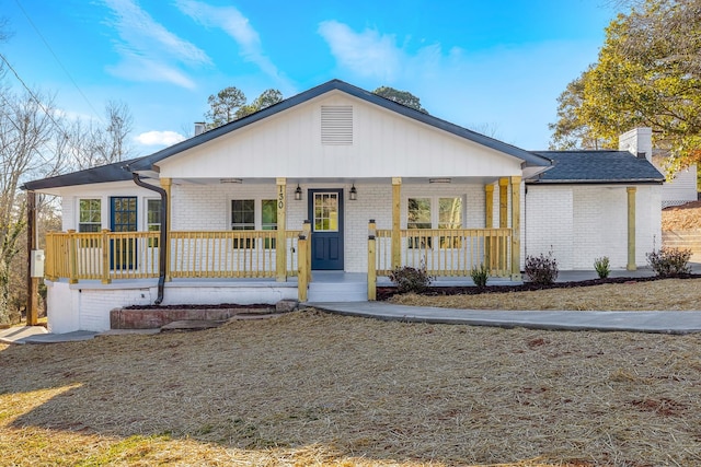 ranch-style house with a porch