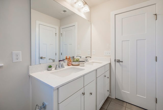 bathroom featuring vanity and tile patterned floors