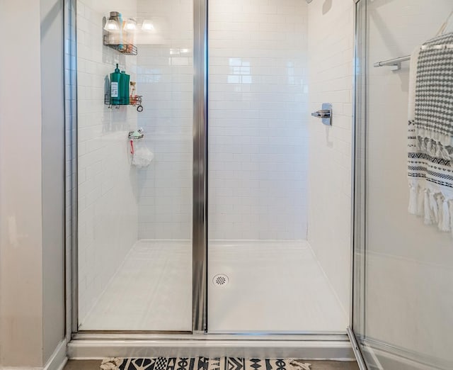 bathroom with an enclosed shower