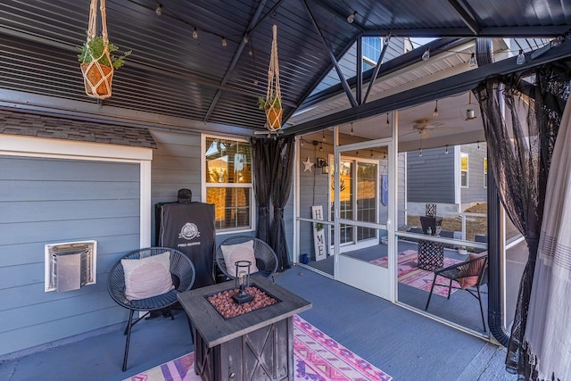 view of patio with an outdoor fire pit