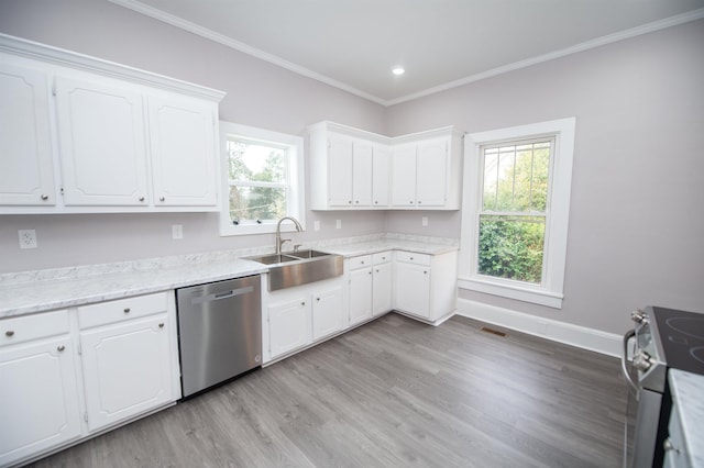 kitchen featuring sink, light hardwood / wood-style flooring, ornamental molding, appliances with stainless steel finishes, and white cabinets