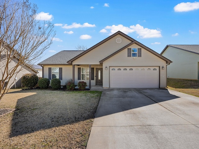 view of front of property with a garage, a front yard, and covered porch